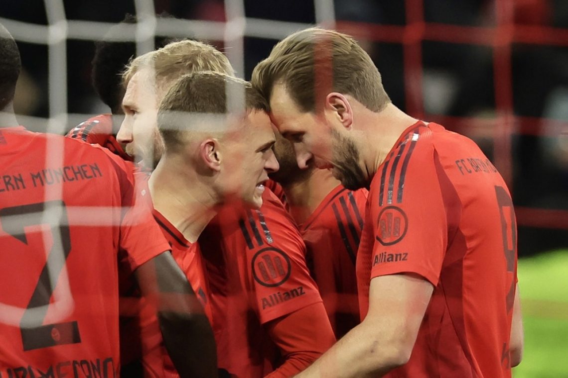 Kane s tremi goli zagotovil Bayernu zmago v bavarskem derbiju